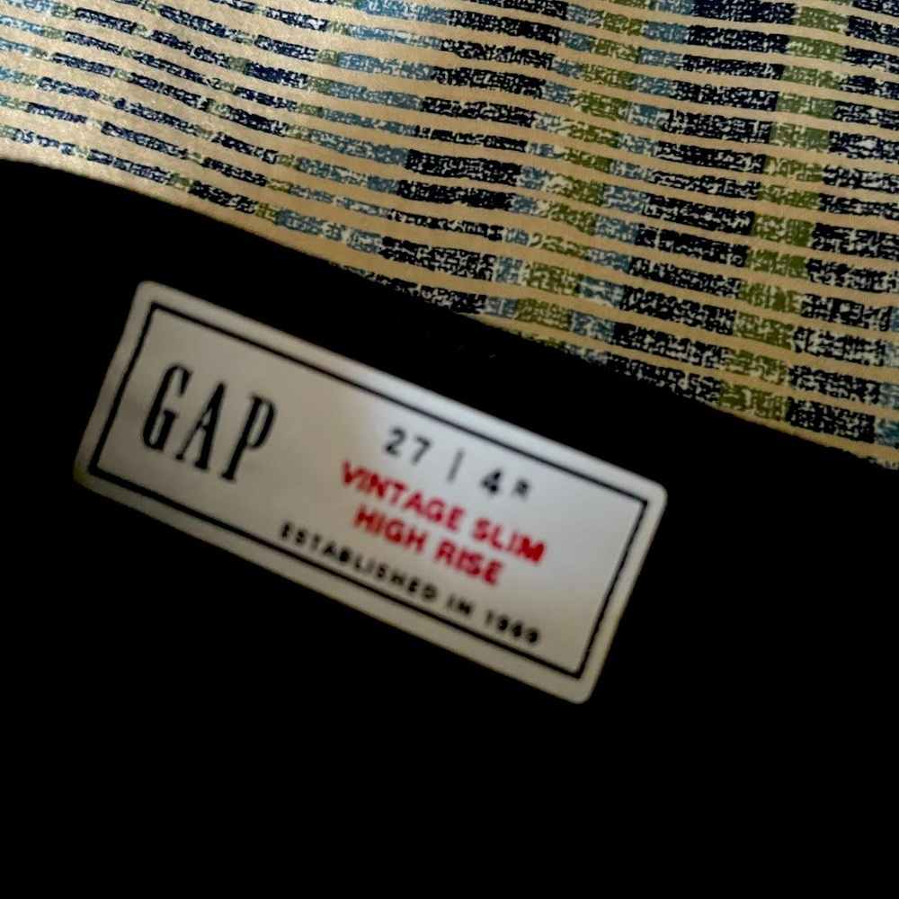 GAP Black crop jeans with fringe bottom.